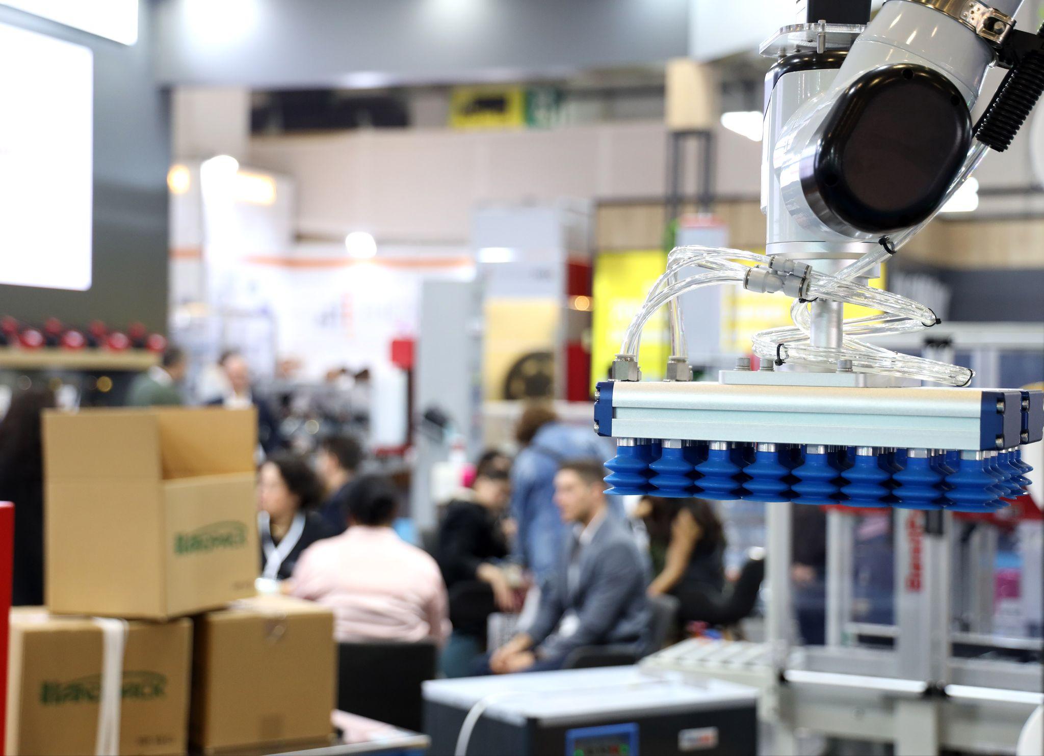Istanbul's Tüyap venue will stage Eurasia Packaging's 31st edition in October: a robotic vacuum gripper lifting cartons on an exhibitor stand at Eurasia Packaging Istanbul